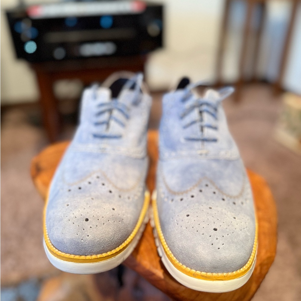 Cole Haan Zero Grand Light Blue Suede Oxfords with orange/yellow Accents.